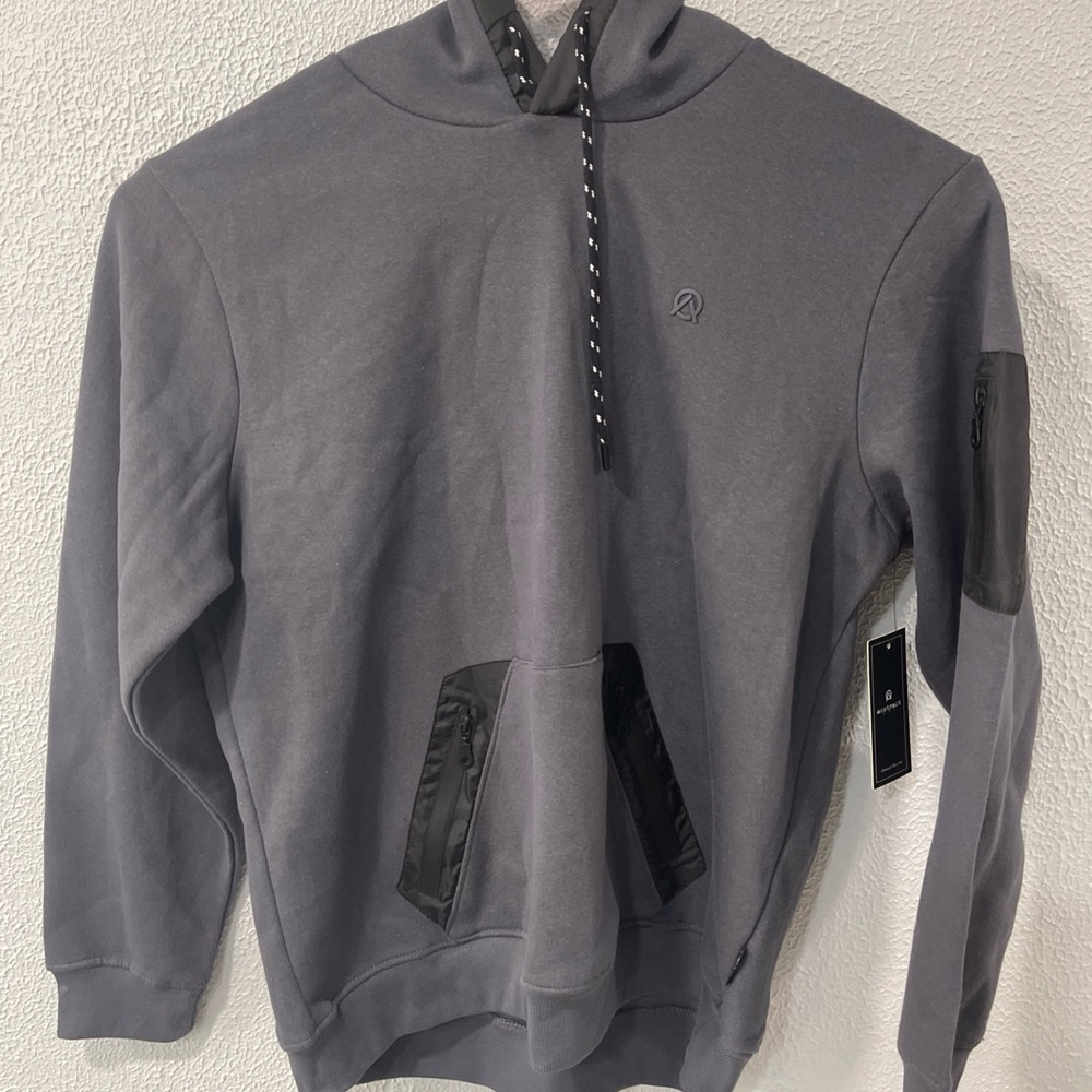 abstract One Hoodie Gray In Men’s Size XL. 3 Zippered Pockets, 1 On The Sleeve